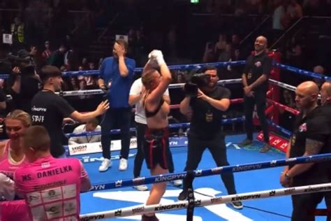 mma fighter flashes crowd after win|Kingpyn Boxing results: Daniella Hemsley flashes audience after。